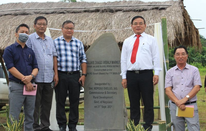 Commissioner & Secretary, RD, Neposo Theluo and others during the inauguration of weekly market at Jalukie Zangdi Village.